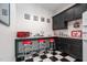 Small kitchen with black cabinets and red retro appliances at 6825 Palaver Ln, Cary, NC 27519