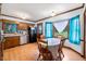 Kitchen dining area with table and chairs, overlooking backyard at 229 Turnipseed Rd, Wendell, NC 27591