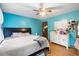 Bedroom with double bed, dresser, and light blue walls at 229 Turnipseed Rd, Wendell, NC 27591
