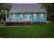 Blue house with deck, steps, and lawn at 229 Turnipseed Rd, Wendell, NC 27591