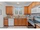 Modern kitchen with granite countertops and stainless steel appliances at 215 Eyam Hall Ln, Apex, NC 27502