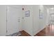 Unit entry with wood floors and simple decor at 215 Eyam Hall Ln, Apex, NC 27502