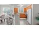 Modern kitchen with granite countertops and wood cabinets at 215 Eyam Hall Ln, Apex, NC 27502