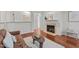 Living room with fireplace and hardwood floors at 215 Eyam Hall Ln, Apex, NC 27502