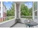 Spacious balcony overlooking wooded area, perfect for relaxing at 215 Eyam Hall Ln, Apex, NC 27502
