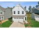 Two-story home with white siding and a two-car garage at 716 Bent Willow Dr # 194, Clayton, NC 27527