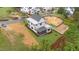 Aerial view of a two-story house with a screened porch and large yard at 322 Waldo St, Cary, NC 27511