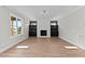 Spacious living room with hardwood floors, fireplace and built-in shelves at 40 Woodford Way, Franklinton, NC 27525