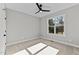 Bright bedroom with neutral walls and plush carpeting at 40 Woodford Way, Franklinton, NC 27525