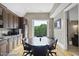 Round table with chairs, granite countertop, and built-in cabinets at 12660 Boyce Milll Road, Raleigh, NC 27613