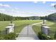 Gated entrance to a large estate with lush lawns at 12660 Boyce Milll Road, Raleigh, NC 27613