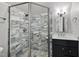 Updated bathroom with a large walk-in shower and marble tile at 12660 Boyce Milll Road, Raleigh, NC 27613