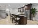 Basement bar with a granite countertop and stainless steel appliances at 12660 Boyce Milll Road, Raleigh, NC 27613