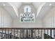 Elegant two-story entryway with a grand chandelier and view to the foyer at 12660 Boyce Milll Road, Raleigh, NC 27613