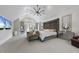 Large main bedroom with a king-size bed and sitting area at 12660 Boyce Milll Road, Raleigh, NC 27613