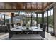 Sunroom with a table, chairs, and view of the backyard at 12660 Boyce Milll Road, Raleigh, NC 27613