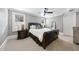 Comfortable bedroom with a leather bed and plenty of natural light at 12660 Boyce Milll Road, Raleigh, NC 27613