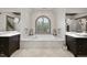 Bathroom with a soaking tub and marble tile at 12660 Boyce Milll Road, Raleigh, NC 27613