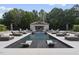 Inviting pool with waterfall feature and plenty of seating at 12660 Boyce Milll Road, Raleigh, NC 27613