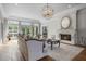 Spacious living room features a fireplace and ample natural light at 12660 Boyce Milll Road, Raleigh, NC 27613