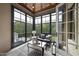 Relaxing screened porch with seating and pool view at 12660 Boyce Milll Road, Raleigh, NC 27613