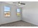 Well-lit bedroom featuring neutral walls and carpeting at 2333 E Main St, Durham, NC 27703