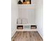 Built-in bench with storage in a bright entryway at 2333 E Main St, Durham, NC 27703