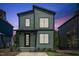 Modern two-story house with green exterior at 2333 E Main St, Durham, NC 27703