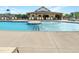 Community pool with adjacent lounge area at 201 Big Bradley Dr, Wendell, NC 27591