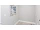 Bright laundry room with tile flooring and decorative wall art at 173 Ascot, Rocky Mount, NC 27804