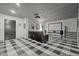 Basement home theater with projector, screen, and seating at 1201 Bancroft St, Raleigh, NC 27612