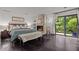 Main bedroom with fireplace and private balcony access at 1201 Bancroft St, Raleigh, NC 27612