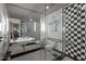 Elegant bathroom, featuring a checkerboard design and glass shower at 1201 Bancroft St, Raleigh, NC 27612