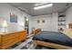 Basement bedroom with ensuite bathroom and wood flooring at 1201 Bancroft St, Raleigh, NC 27612