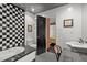 Stylish bathroom with a checkerboard design and modern fixtures at 1201 Bancroft St, Raleigh, NC 27612
