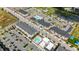 Aerial view of community with multiple apartment buildings and pools at 5436 Crescent Square St, Raleigh, NC 27616