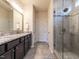 Bathroom boasts a large walk-in shower and double vanity at 1308 Holly Blue, Fuquay Varina, NC 27526