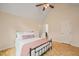 Cozy bedroom with high ceiling and en-suite bathroom access at 308 Trimble Ave, Cary, NC 27511