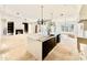 Modern kitchen with large island and marble countertops at 3407 Churchill Rd, Raleigh, NC 27607