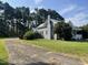 Another view of the house's exterior and its surroundings at 409 W Main St, Spring Hope, NC 27882