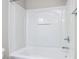 Clean bathroom with a white bathtub and shower surround at 202 Linden Park Ln, Cary, NC 27519