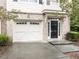 Two-car garage with attached entry to home at 202 Linden Park Ln, Cary, NC 27519