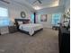 Spacious main bedroom with carpeted floors and an ensuite bathroom at 1491 Pecan Dr # Model Home, Nashville, NC 27856
