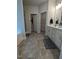 Large bathroom with double vanity, soaking tub, and walk-in shower at 1491 Pecan Dr # Model Home, Nashville, NC 27856