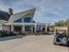 Clubhouse with outdoor seating and golf carts at 95 Old Hickory, Pittsboro, NC 27312