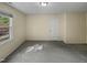 Simple bedroom with grey carpet and a closet at 1517 Wiljohn Rd, Garner, NC 27529