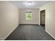 Simple bedroom with grey carpet and a closet at 1517 Wiljohn Rd, Garner, NC 27529