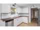 Kitchen with white cabinets, stainless steel appliances and wood countertops at 4312 Windstorm Way, Raleigh, NC 27616