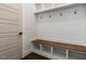 Built-in bench with cubbies and hooks at 142 Lila Dr, Pittsboro, NC 27312