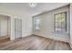 Well-lit bedroom with hardwood floors and closet at 512 S 4Th St, Smithfield, NC 27577